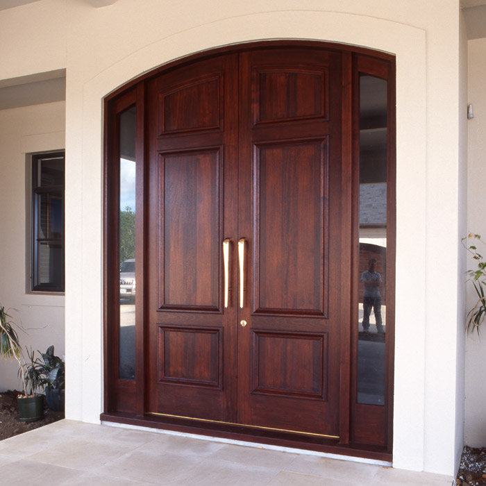 Large feature double wooden doors with side lights